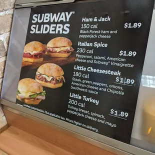 a menu for sandwiches on a counter
