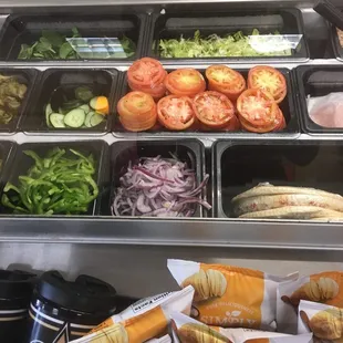 a variety of sandwiches and salads