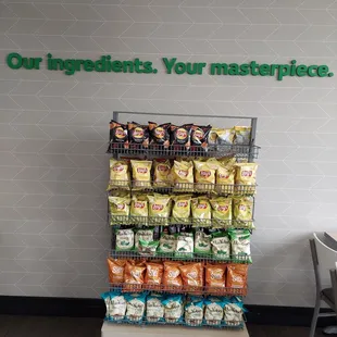 a display of chips and other snacks