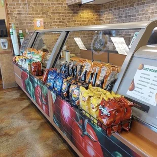 a variety of snacks on display at a subway