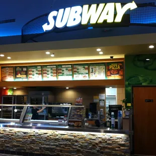 the inside of a subway restaurant