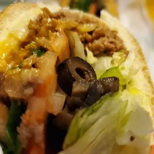 Closeup. Steak and cheese ft long.