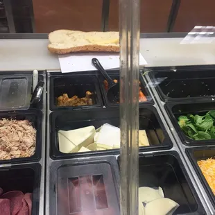 a variety of food items in plastic containers