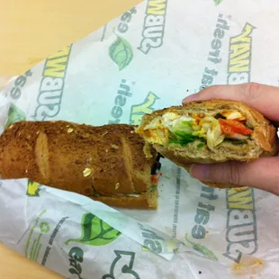 $6 footling special. Lettuce, spinach, olives, tomatoes, and lite mayo. 9 grain honey oat bread.