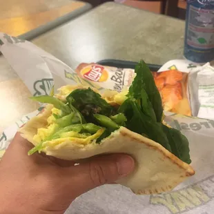 Breakfast all day. Flat bread yellow egg and bacon bell pepper, cheese, olive and chipotle sauce is great combo.