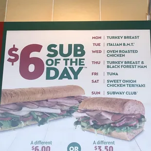 a sub of the day sign in a subway