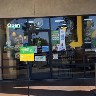 the entrance to a subway restaurant