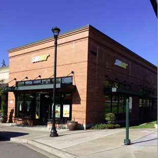 the entrance to a subway restaurant