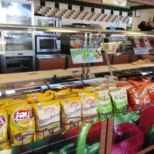 Chips and area where they make the sandwiches
