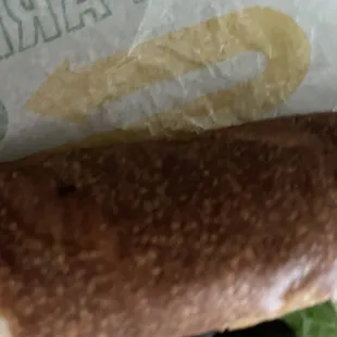 a closeup of a hot dog on a bun