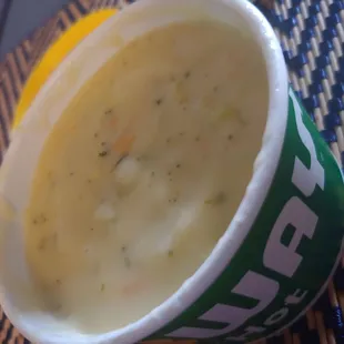 a cup of soup on a table