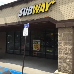 the entrance of a subway restaurant