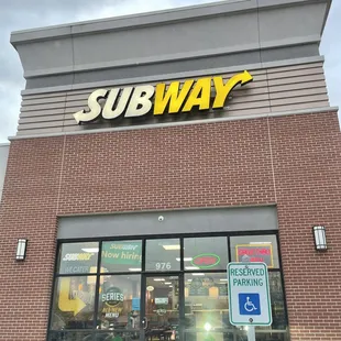 the entrance of a subway restaurant