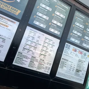 menus on the side of a building