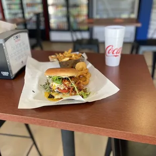 a sandwich and fries on a table