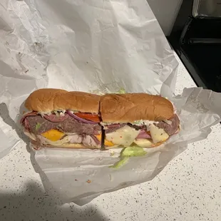 The Maverick!! Over 2lbs of meat!!  If that is not a Texas sammy, I don't know what is?!?!