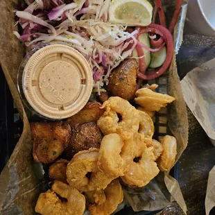 Large shrimp  with smashed potatoes,  cole slaw and pickled onions