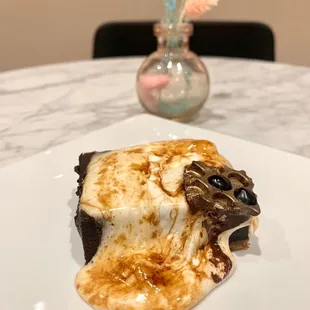 a piece of cake on a white plate