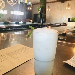 a drink on a table in a restaurant