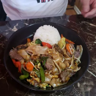 a plate of stir fried vegetables