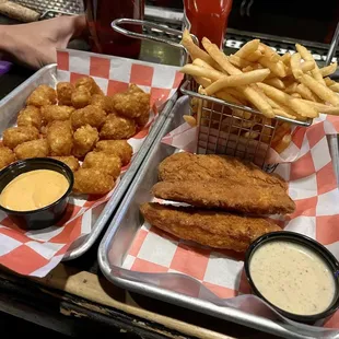 Tater tots, and chicken tenders with fries