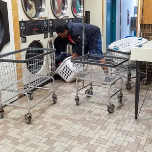 Poor guy had to move his washed clothes to the next dryer over - the coin receptor was jamming on that dryer as well.