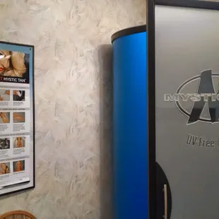 Mystic spray tan booth. Light medium and dark color options along with bronzing boosters and aromas for an enhanced experience.