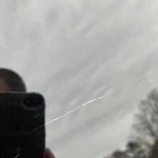 Damage that was done to my vehicle at Suds carwash-large scratches in the back glass