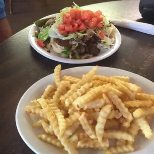 Philly roast beef sandwich. Huge portion of fries