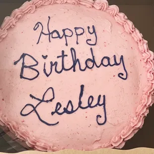 Two tier 9 inch chocolate cake with raspberry buttercream