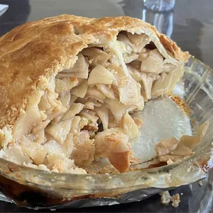 Inside of double crusted apple pie..it&apos;s stuffed with apples and not sickly sweet like store pies