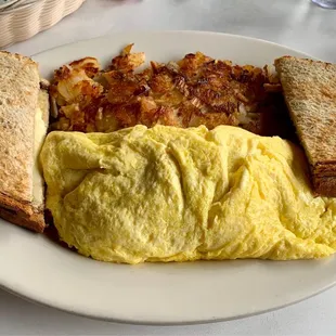 Meat lover's omelette, hash browns, rye toast