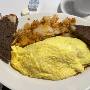 Corned beef hash and cheddar omelette.