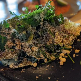 Ensalada little gem, buttermilk dressing, charred corn, parmesan $13