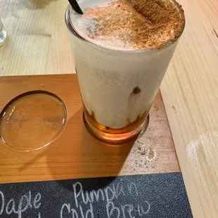 Pumpkin cold brew with pumpkin cold foam on the fall coffee flight.