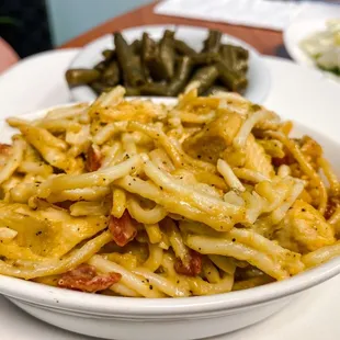 a bowl of pasta and vegetables