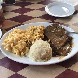 Roast beef with cream cheese corn, mac and cheese and mashed potatoes. Delicious.