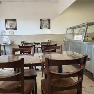 Inside of the restaurant. Tables have been updated with a sticker to look newer.