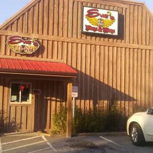 a car parked in front of the building