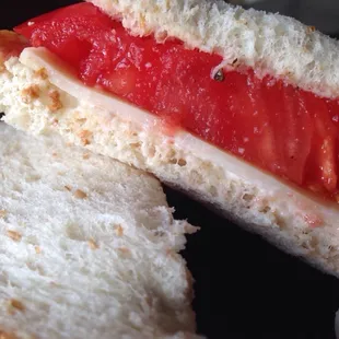 One of my summer treats is a tomato cheese sandwich (with mayo, salt and pepper). Amazing with the heirloom tomato!