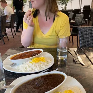 a woman eating a meal