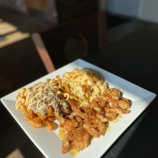 Lemon Pepper Shrimp w/ Hot Honey Drizzle Jerk Crab Fries Mac n cheese