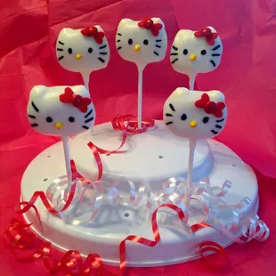 a hello kitty cake on a plate