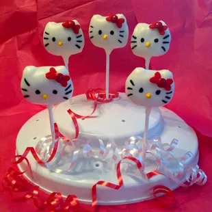 a hello kitty cake on a plate