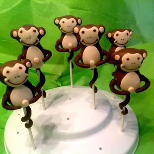 five monkeys on a cake