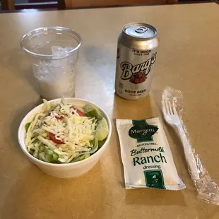 Lunch special salad and can of pop