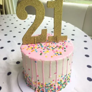 Pink drips and confetti birthday cake