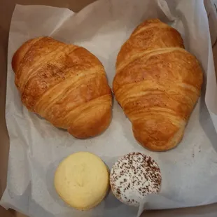 2 artichoke,  leek, and Boursin garlic and herb cheese croissants , 1 yuzu macaron and 1 tiramisu macaron