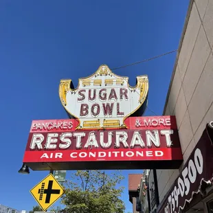 a neon sign for a restaurant