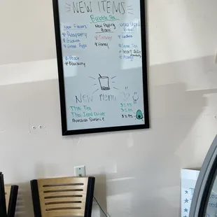 a white board with writing on it